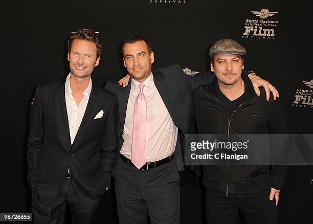 Composer Brian Tyler, producer Michael Weiss and Writer Andy Weiss arrive at the Arlington Theatre during the 25th Santa Barbara International Film...