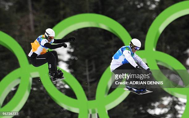 Robert Fagan of Canada and Lukas Gruener of Austria compete in the Men's Snowboard SBX finals at Cypress Mountain during the Vancouver Winter...