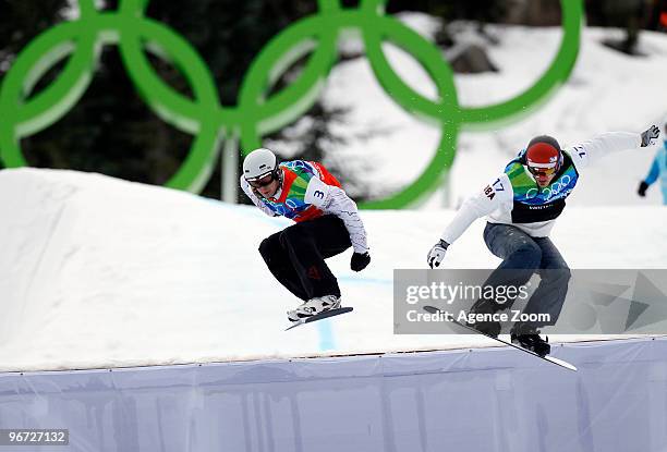 Seth Wescott of the USA takes 1st place, Mike Robertson of Canada takes 2nd place during the Men's Snowboard Cross on Day 4 of the 2010 Vancouver...