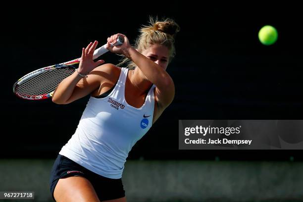 Sonja Larsen of Barry University returns a ball against the University of West Florida during the Division II Women's Tennis Championship held at the...