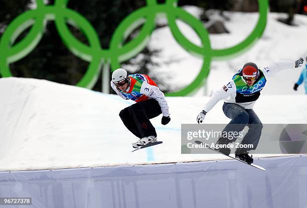 Seth Wescott of the USA takes 1st place, Mike Robertson of Canada takes 2nd place during the Men's Snowboard Cross on Day 4 of the 2010 Vancouver...