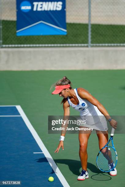 Paula Coyos of the University of West Florida serves a ball against Barry University during the Division II Women's Tennis Championship held at the...