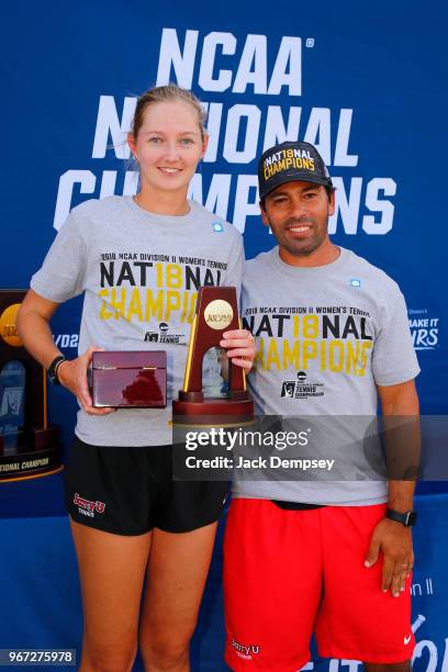 Head coach Avi Kigel and Zuza Maciejewska of Barry University celebrate during the Division II Women's Tennis Championship held at the Surprise...