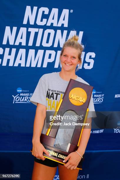 Carolin Schmidt of Barry University celebrates with the trophy during the Division II Women's Tennis Championship held at the Surprise Tennis &...