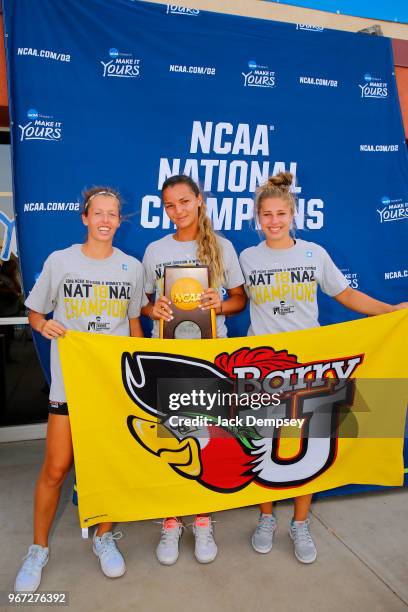 Judith Bohnenkamp, Verena Schmidt, and Sonja Larsen of Barry University celebrate during the Division II Women's Tennis Championship held at the...