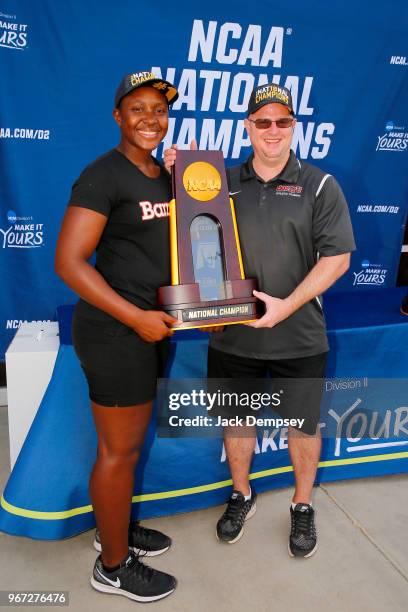 Athletic trainers Kayshia Brady and Scott Freer of Barry University celebrate during the Division II Women's Tennis Championship held at the Surprise...