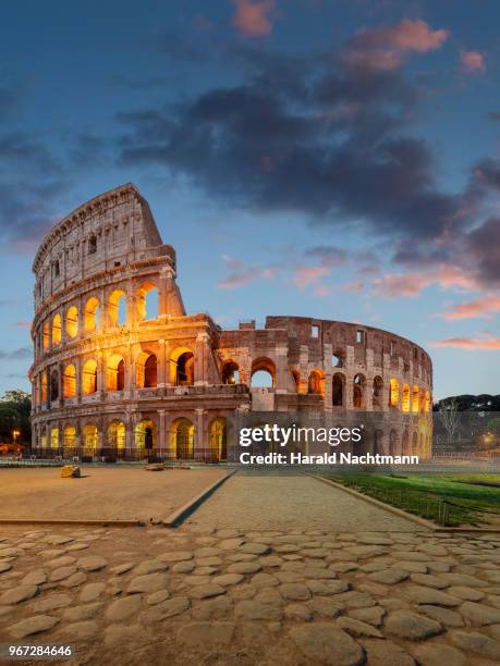 colosseum in the evening - rome italy colosseum stock pictures, royalty-free photos & images