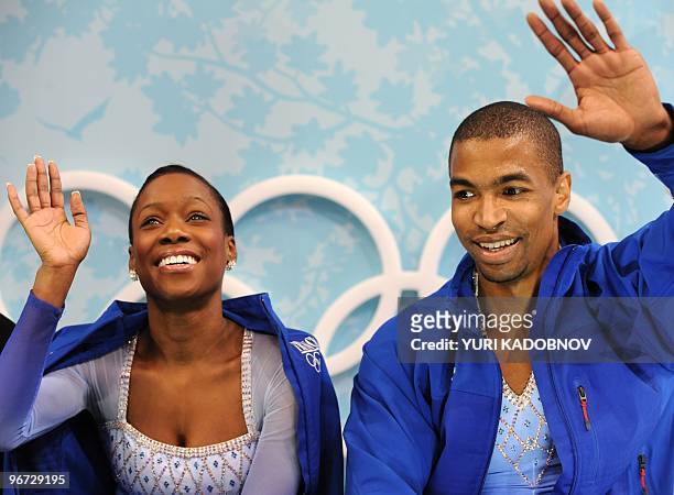France's Vanessa James and Yannick Bonheur waves to the public as waiting for their results in the kiss and cry area after performing in their figure...