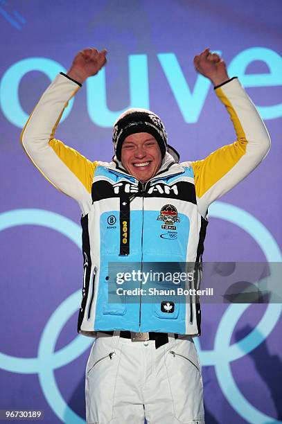 Felix Loch of Germany celebrates before receiving the gold medal during the medal ceremony for the men�s luge singles at Whistler Medal Plaza on day...