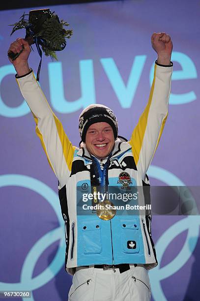 Felix Loch of Germany celebrates with the gold medal during the medal ceremony for the men�s luge singles at Whistler Medal Plaza on day 4 of the...