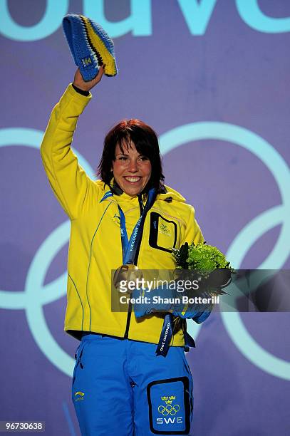 Charlotte Kalla of Sweden celebrates with the gold medal during the medal ceremony for the Cross-Country Skiing Ladies' 10 km Free at Whistler Medals...