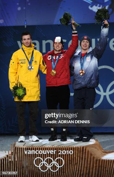 Canada's gold medalist Alexandre Bilodeau , Australia's silver medalist Dale Begg-Smith and USA's bronze medalist Bryon Wilson pose during the medal...