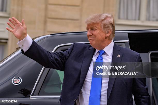 Le président américain Donald Trump dans la cour du Palais de l'Elysée le 14 juillet 2017, Paris, France.