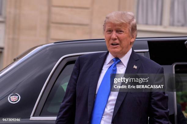 Le président américain Donald Trump dans la cour du Palais de l'Elysée le 14 juillet 2017, Paris, France.