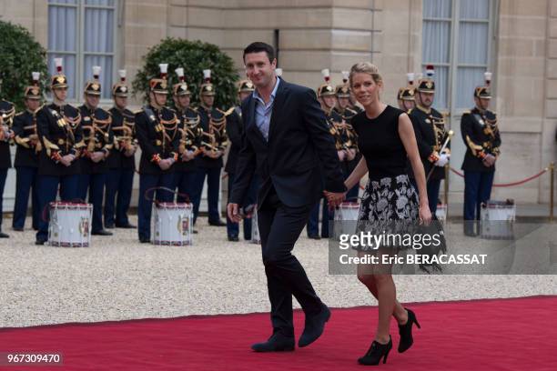Tiphaine Auzière et son époux arrivent au palais présidentiel de l'Elysée pour assister à la cérémonie officielle de l'nvestiture d'Emmanuel Macron,...