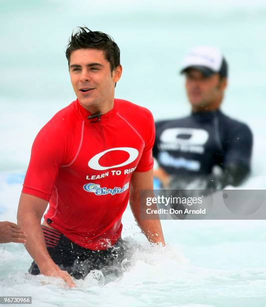 Zac Efron attends Oakley's "Learn To Ride" charity learn-to-surf event in aid of the One Sight Foundation at Bondi Beach on February 16, 2010 in...