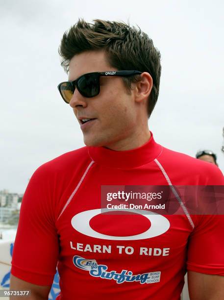 Zac Efron attends Oakley's "Learn To Ride" charity learn-to-surf event in aid of the One Sight Foundation at Bondi Beach on February 16, 2010 in...