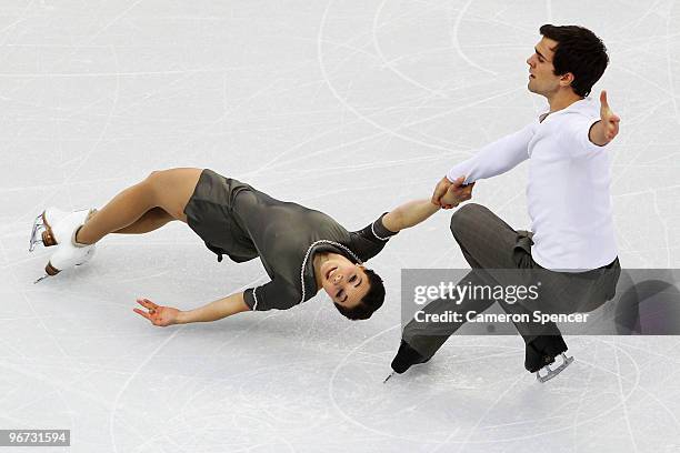 Jessica Dube and Bryce Davison of Canada compete in the figure skating pairs free skating on day 4 of the Vancouver 2010 Winter Olympics at the...