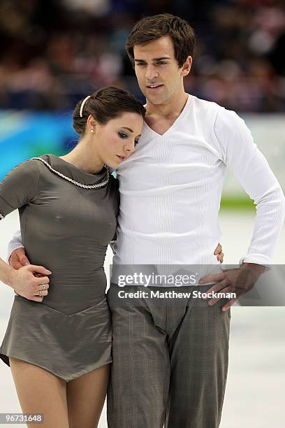 Jessica Dube and Bryce Davison of Canada reacts after they competed in the figure skating pairs free skating on day 4 of the Vancouver 2010 Winter...