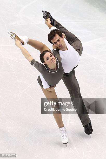 Jessica Dube and Bryce Davison of Canada compete in the figure skating pairs free skating on day 4 of the Vancouver 2010 Winter Olympics at the...