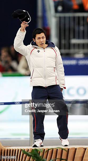 Joji Kato of Japan celebrates the bronze during the flower ceremony for the men's 500 m speed skating held at the Richmond Olympic Oval on day 4 of...