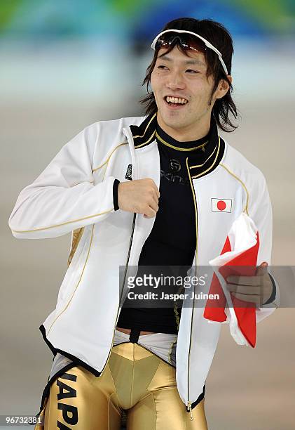 Keiichiro Nagashima of Japan celebrates his run in the men's 500 m speed skating held at the Richmond Olympic Oval on day 4 of the Vancouver 2010...