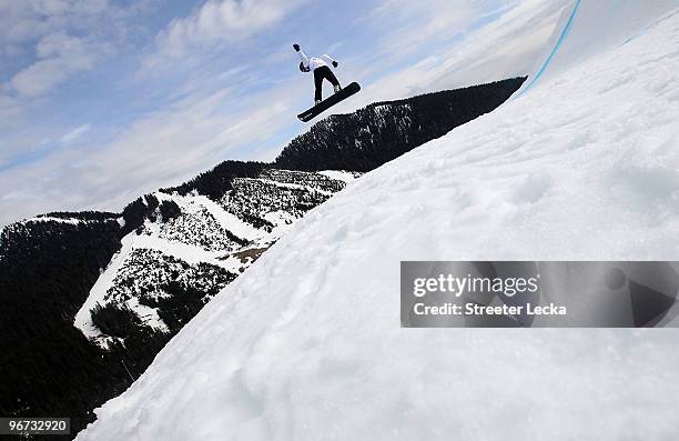 Competitor makes his way down the course on day four of the Vancouver 2010 Winter Olympics at Cypress Snowboard & Ski-Cross Stadium on February 13,...