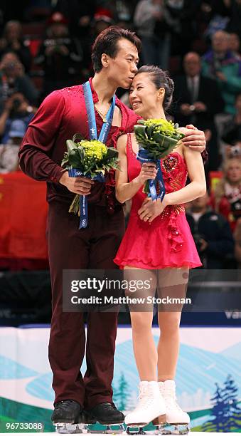 Xue Shen and Hongbo Zhao of China win the gold medal in the Figure Skating Pairs Free Program on day 4 of the Vancouver 2010 Winter Olympics at the...