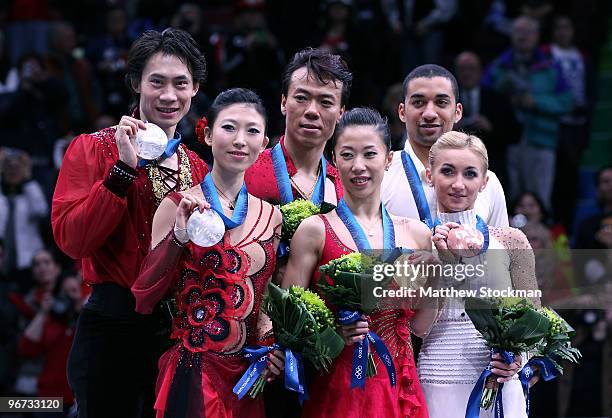 Jian Tong and Qing Pang of China win the silver medal, Hongbo Zhao and Xue Shen of China win the gold medal, and Robin Szolkowy and Aliona Savchenko...