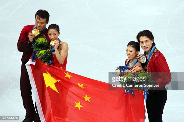Hongbo Zhao and Xue Shen of China win the gold medal and Jian Tong and Qing Pang of China win the silver medal in the Figure Skating Pairs Free...