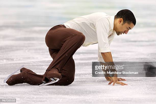 Robin Szolkowy of Germany falls while competing in the Figure Skating Pairs Free Program on day 4 of the Vancouver 2010 Winter Olympics at the...