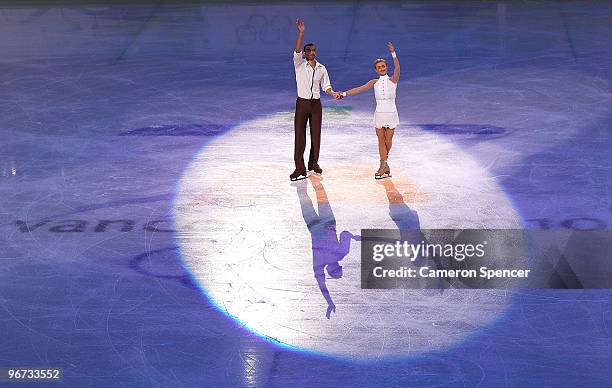 Aliona Savchenko and Robin Szolkowy of Germany greet the crowd after the Figure Skating Pairs Free Program on day 4 of the Vancouver 2010 Winter...