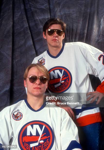 Darius Kasparaitis and Vladimir Malakhov, both from the USSR and New York Islanders, pose in their sunglasses circa November, 1992 at the Nassau...