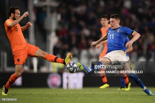 Netherlands National team defender Daley Blind fights for the ball with Italy's national team forward Andrea Belotti during the international...