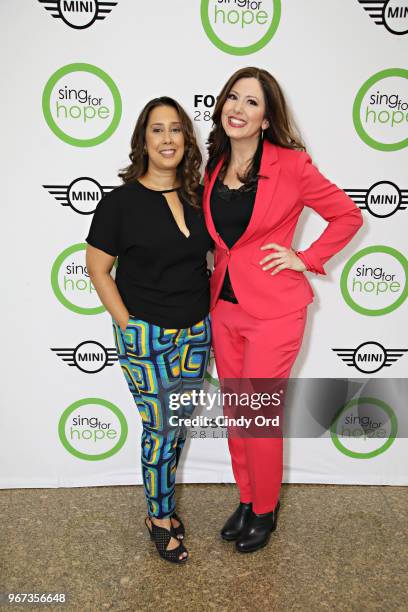 Sing For Hope co-founders Monica Yunus and Camille Zamora pose for a photo as The 2018 Sing for Hope Pianos are unveiled at 28 Liberty on June 4,...