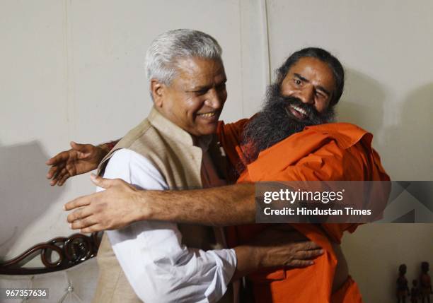 Bharatiya Janata Party senior leader Ramlal meet yoga guru Ramdev for a meeting to discuss 'Sampark for Samarthan' campaign at Baba Ramdevs farmhouse...