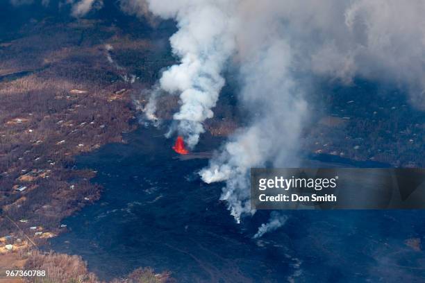 Lava from the Kilauea Volcano burns along the East Rift Zone which runs through Leilani Estates on the Big Island on June 1, 2018 in Pahoa, Hawaii....