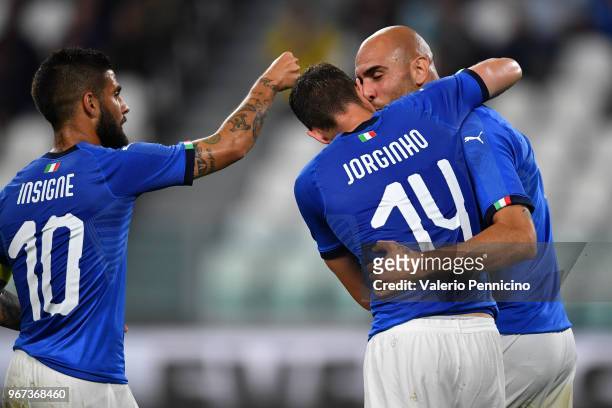 Simone Zaza of Italy celebrates with Lorenzo Insigne and Jorginho after scoring the opening goal during the International Friendly match between...