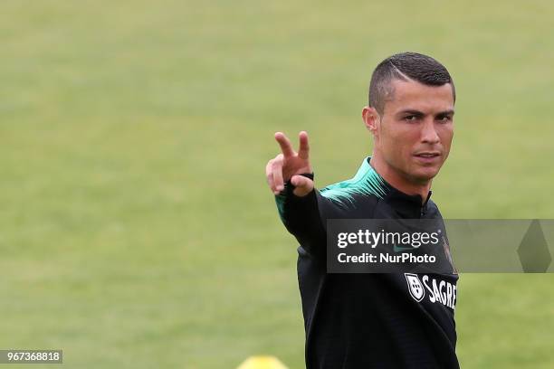 Portugal's forward Cristiano Ronaldo gestures during a training session at Cidade do Futebol training camp in Oeiras, outskirts of Lisbon, on June 4...