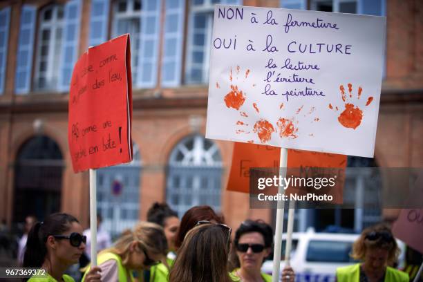 Placard reading 'No the closing, yes to culture, reading, writing, painting'. Primary school teachers and parents'pupils gathered and demonstrated in...