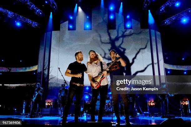 Singer-songwriters Dierks Bentley, John Osborne and T.J. Osborne of musical duo Brothers Osborne perform onstage during Day 1 2018 CMT Music Awards...