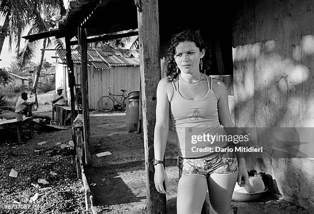 Street scene in the favela 'Ilha de Deus' , Recife, Brazil, 2002. A favela is the Brazilian equivalent of a shanty town, which are generally found on...