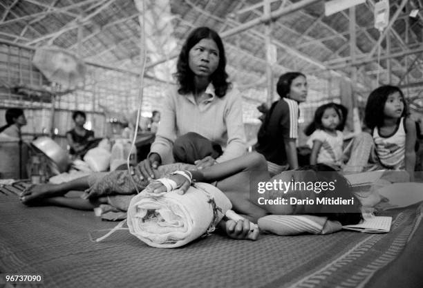 Cambodian refugees in a hospital in a refugee camp set up by the UNHCR in Thailand, near the border with Cambodia, 1987. In November 1978, Vietnam...