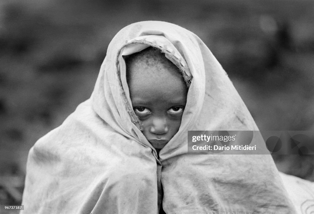X Rwandan A child orphaned during the 1994 Rwandan genocide is waiting for help ...
