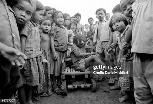 Cambodian refugee children in a refugee camp set up by the UNHCR in Thailand, near the border with Cambodia, 1987. In November 1978, Vietnam invaded...