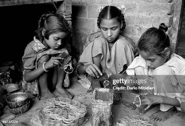 Bangle Making 730 Glass Bangles Stock Photos, High-Res Pictures, and Images - Getty ...