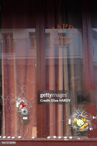 Impacts de balle sur la vitrine du café 'Le Carillon', le 15 novembre 2015, Paris, France.