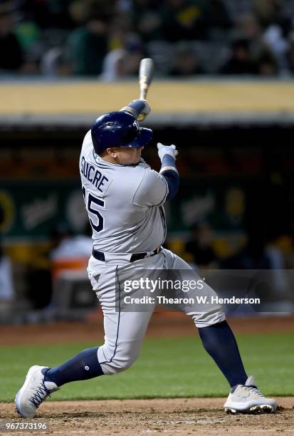 Jesus Sucre of the Tampa Bay Rays bats against the Oakland Athletics in the top of the six inning at the Oakland Alameda Coliseum on May 30, 2018 in...