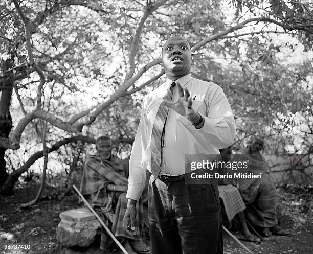 Land rights and human rights lawyer Lucas Ole Naikumi and members of SIMOO at Olosho-oibor, near Ngong, Kenya, 2003. The group has drawn up the...