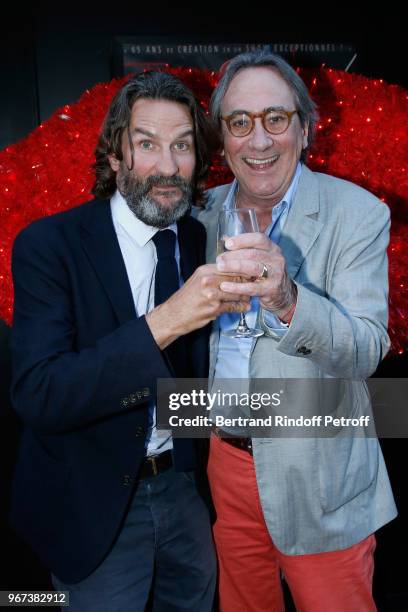 Autor of the preface of the book "Illusions dangereuses", Frederic Beigbeder and singer Philippe Lavil attend the "Illusions Dangereuses" Release...